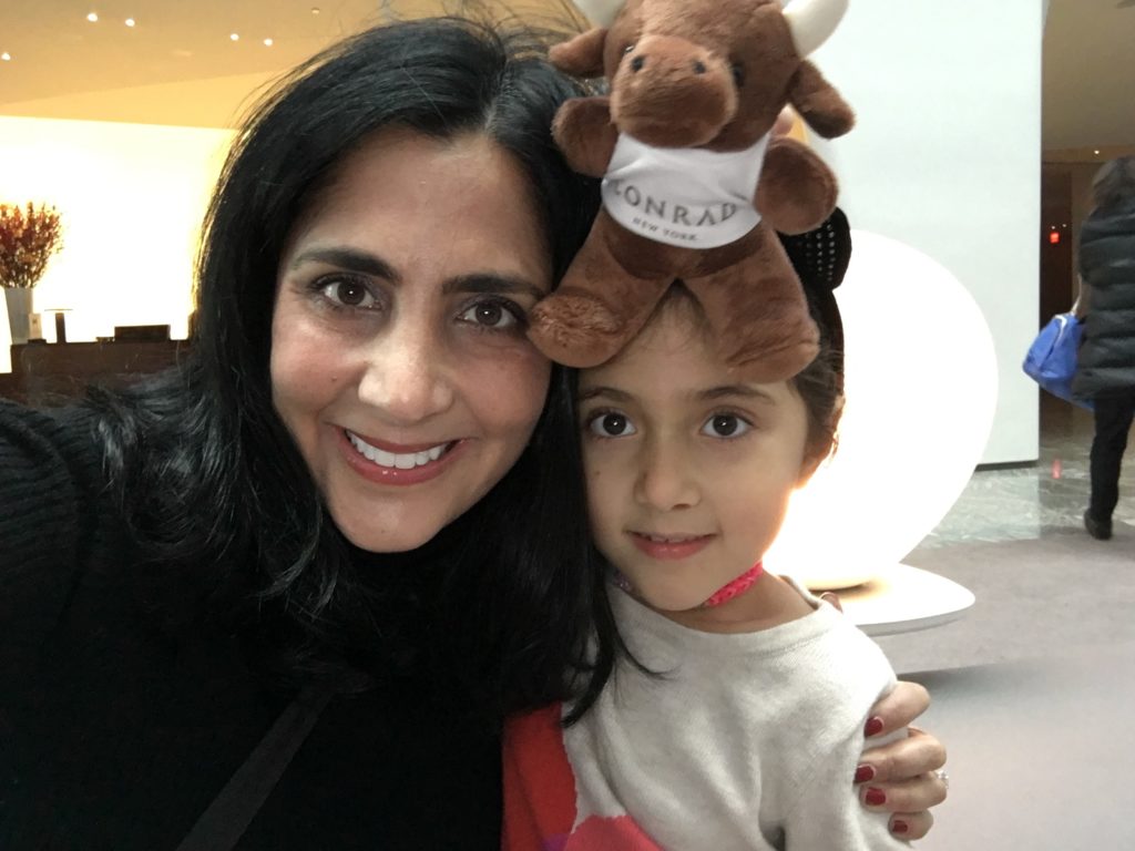 Young travelers receive a stuffed Conrad bull at Conrad, New York.